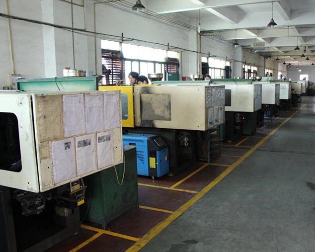 MIM injection molding machines on the Emitech production floor