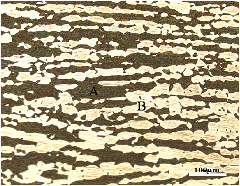 Etched stainless steel microstructure of the kind examined when confirming a metal injection molded part
