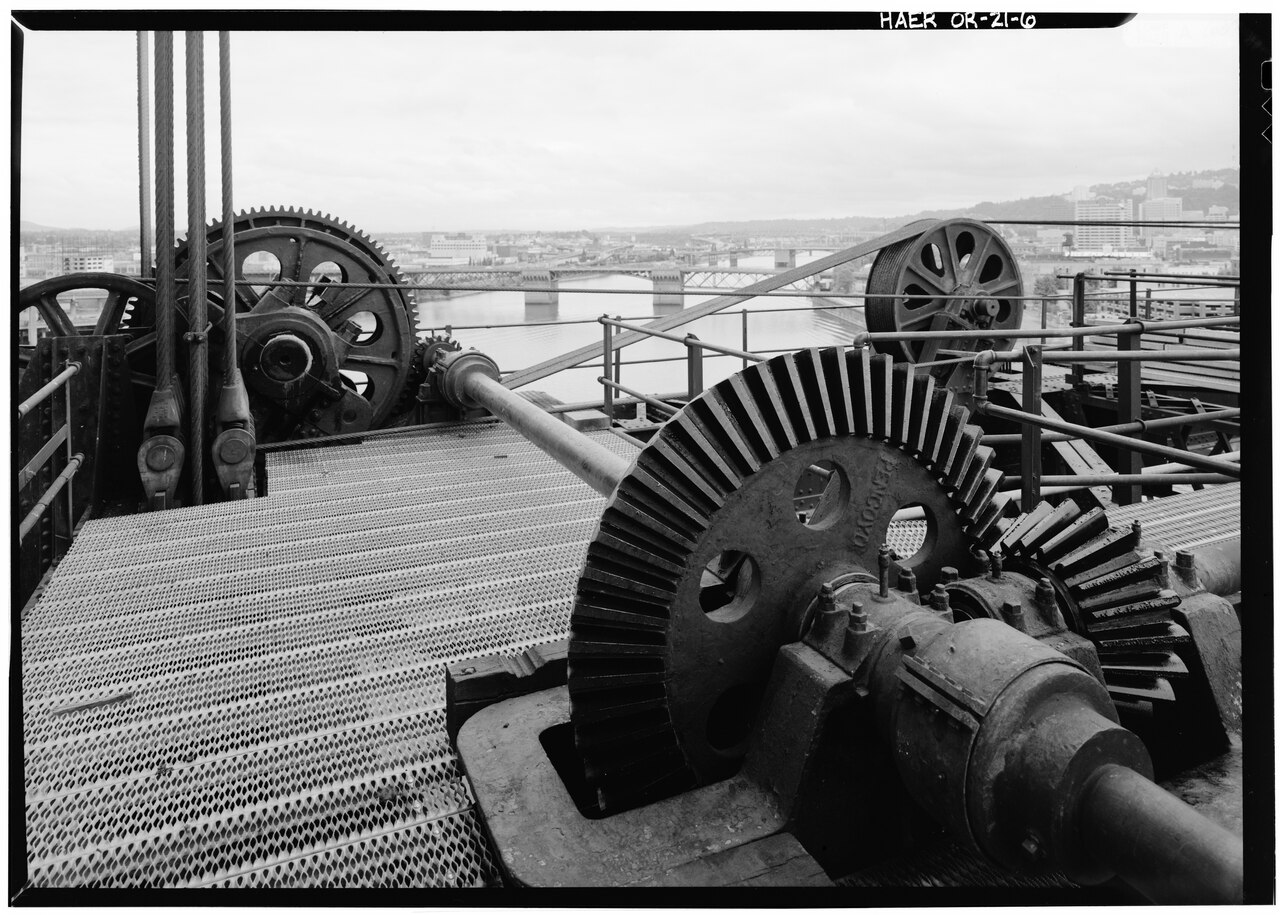 Close-up of small precision steel gears representative of high volume cost-optimized MIM components